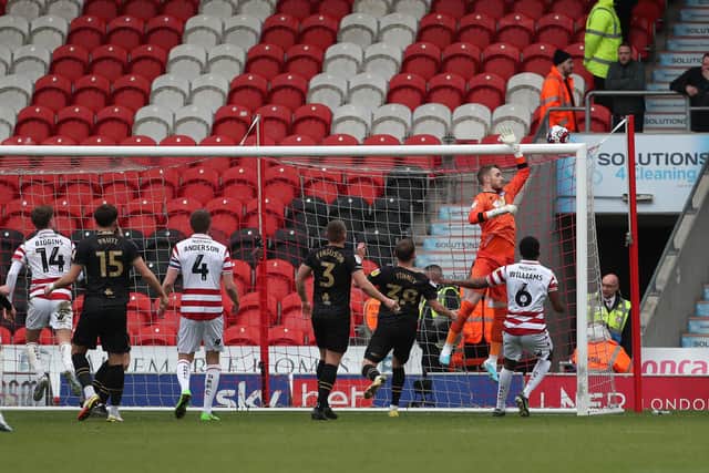 Jakub Stolarczyk of Hartlepool United  tips the ball over for a corner during the League Two match with Doncaster Rovers. (Credit: Mark Fletcher | MI News )