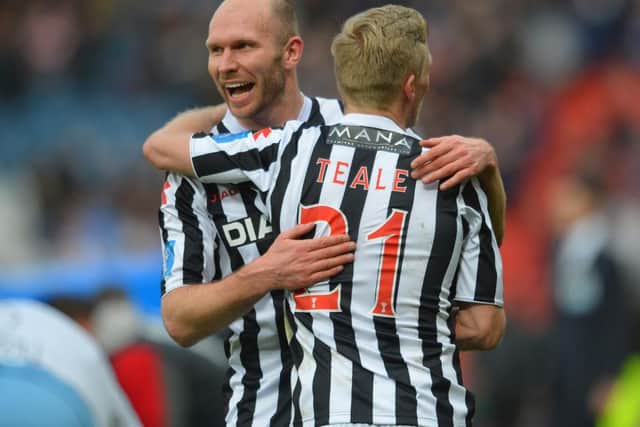 Gary Teale and Sam Parkin of St Mirren celebrates after his side triumphs in the Scottish Communities League Cup Final between St Mirren and Hearts at Hampden Park on March 17, 2013 in Glasgow, Scotland. (Photo by Mark Runnacles/Getty Images)