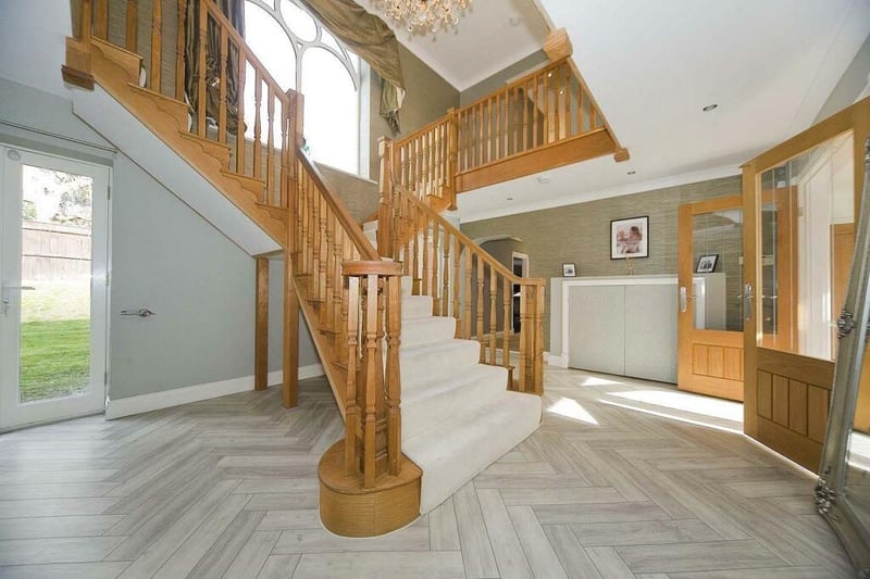 The stunning staircase leading to the first floor.