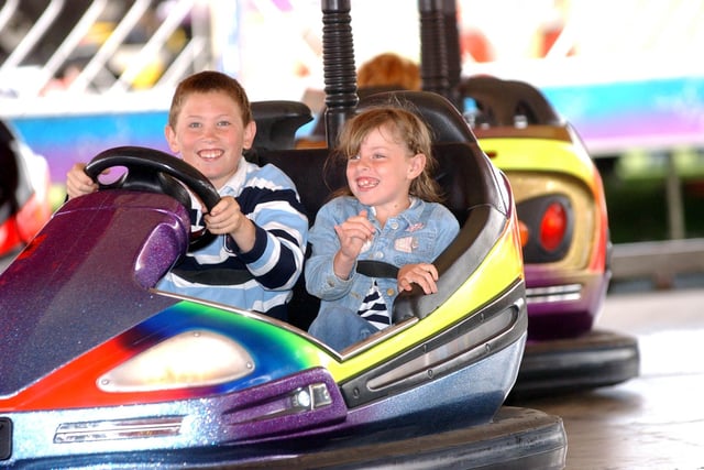 Look at the delight on the faces of these children on the dodgems at the Headland fair in 2003.