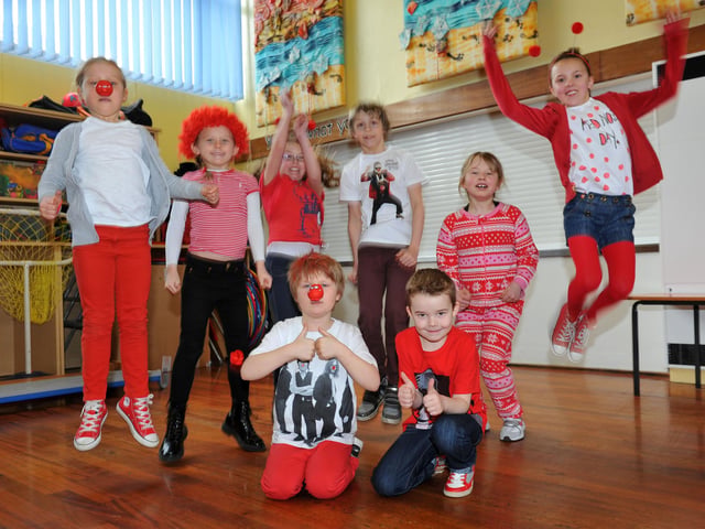 Holy Trinity Church of England Primary School pupils jump for joy in 2013.