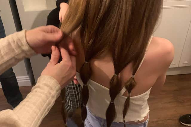 Isabelle McBean, 10, donates over 13 inches of her hair to the Little Princess Trust.