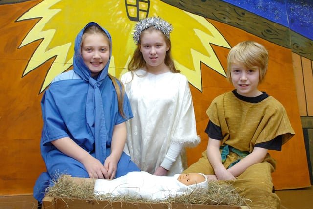 Neve Williams, playing Mary, Layla Picken, as the Angel and Jonathan Hyde, as Joseph in the 2011 production.