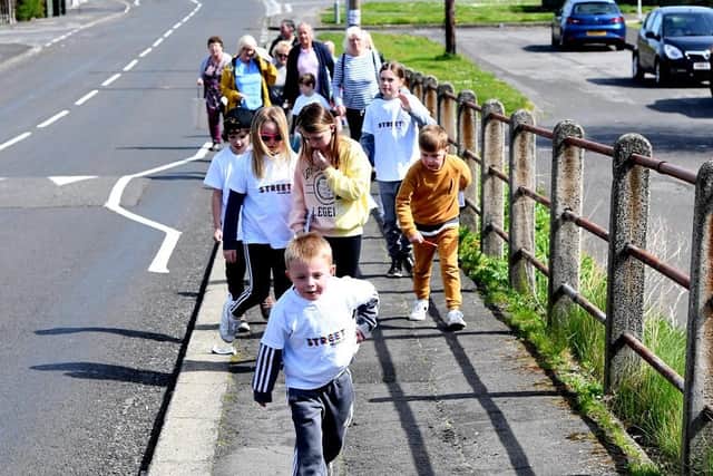 Youngsters on the treasure hunt trail in Blackhall. Picture by Alan Sill.