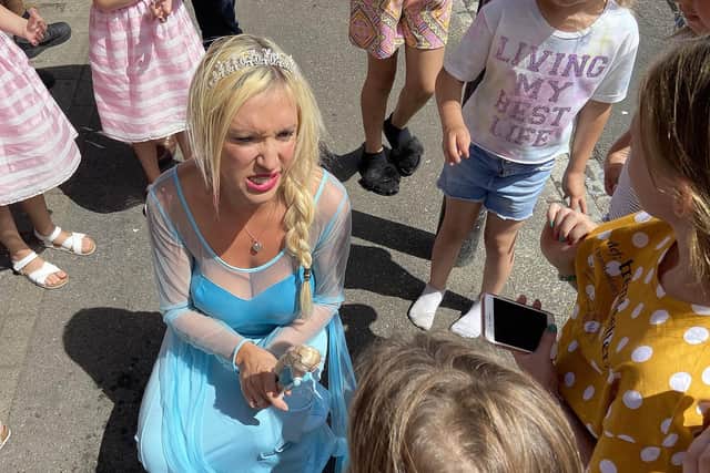 Princess Elisa (Claire Dolan) is pictured entertaining children. Picture by Frank Reid