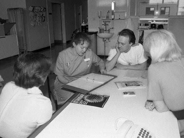 Th Mail spent a day on a ward at Hartlepool General Hospital in1991 as the nursing staff went about their duties. This picture shows some of the staff during a meeting.