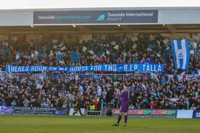 Hartlepool United's fans unveil a tribute to a fellow supporter who recently lost his life. (Photo: Mark Fletcher | MI News)
