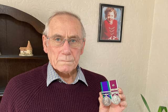 Richie Lee with his service medals he will hand back in protest.