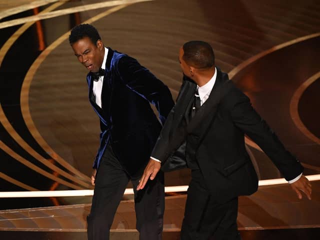 Actor Will Smith appears to slap actor Chris Rock onstage during the 94th Oscars at the Dolby Theatre in Hollywood. Photo by ROBYN BECK/AFP via Getty Images