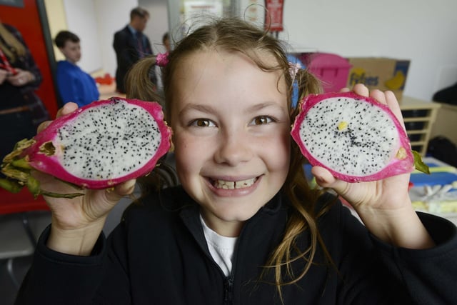 Lilli has fun with fruit during the school's health eating campaign in 2016.