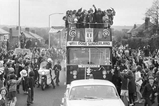 Sunderland fans salute their heroes in Durham Road after the Black Cats won the 1973 FA Cup by defeating Leeds United 1-0.