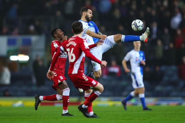 Isaiah Jones of Middlesbrough and Bradley Johnson of Blackburn Rovers during the Sky Bet Championship match. (Photo by Robbie Jay Barratt - AMA/Getty Images)