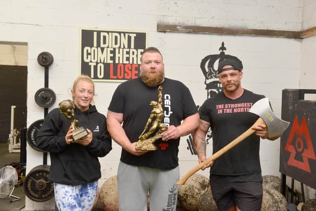 Northern Strength and Performance gym members (from left) Rachael Greathead, Alan Grieves and Danny Dawson-Weatherill with their titles.