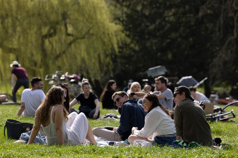 People enjoy the sunshine on March 30, 2021 in Cambridge, England. (Photo by Dan Kitwood/Getty Images)