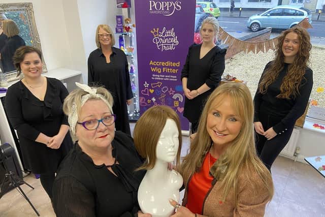 Tracy Bourne (left), salon manager and qualified wig fitter at Poppy's Hairdressing, Liz Pullar, specialist wig fitter and salon relationship coordinator (right) and staff.
