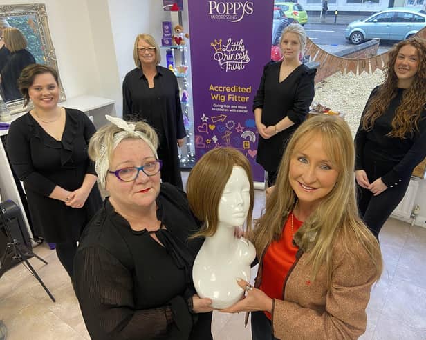 Tracy Bourne (left), salon manager and qualified wig fitter at Poppy's Hairdressing, Liz Pullar, specialist wig fitter and salon relationship coordinator (right) and staff.