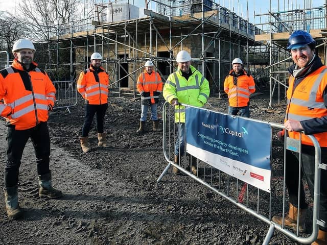Acland Homes’ Stephen Litherland, far right, with construction partners.