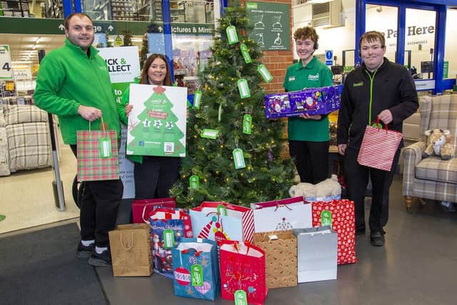 From left: Ryan Shears, Lyndsay Hastings, Jaden Burgess and Liam Robson, with the Giving Tree at Dunelm.