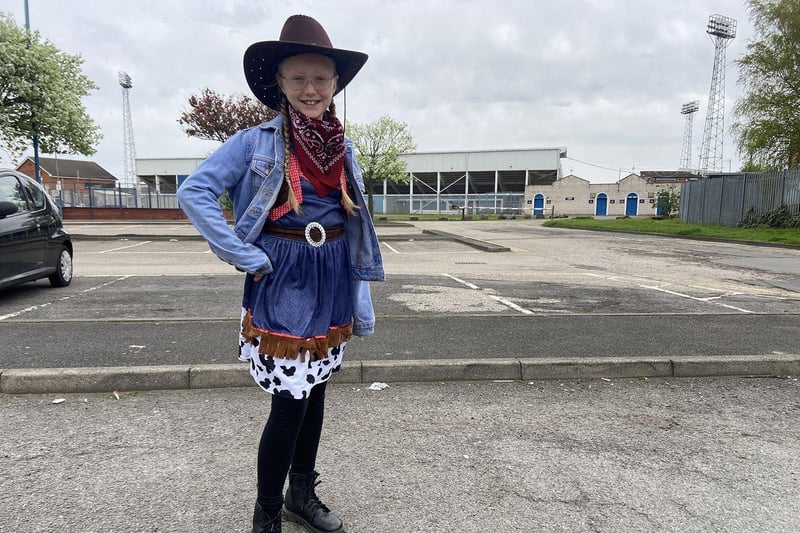 Willow Taylor looking great in her fancy dress outfit before she sets off for Hartlepool United's last game of the season at Stockport County. Picture by FRANK REID