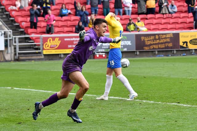 Brad James after saving Matt Buse's penalty in the National League promotion final penalty shoot out against Torquay United.