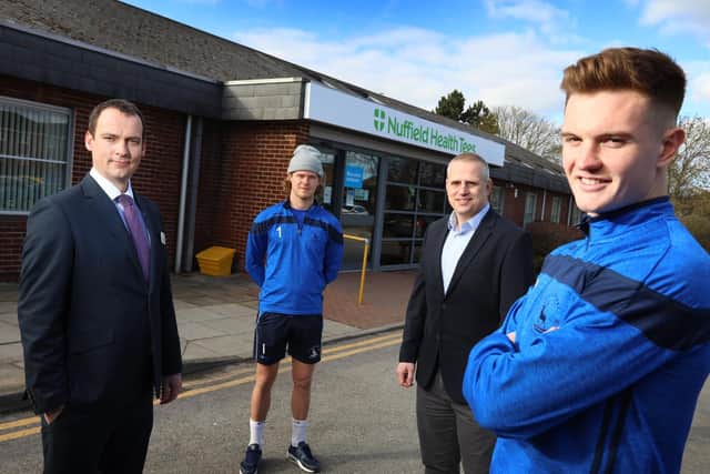 From left: Hospital Director Steve Sharp, Sales and Service Manager Ross Huntley outside Nuffield Health Tees Hospital with Ben Killip and Mark Shelton from Hartlepool United. Picture: Simon Williams, Crest Photography.