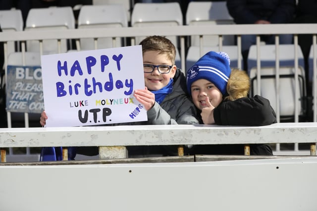 Pools supporters show their support for star striker Luke Molyneux who celebrated his 24th birthday against Mansfield Town (Credit: Mark Fletcher | MI News)