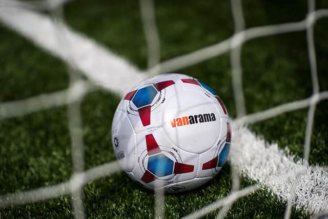 The match ball on a plastic 3G pitch at Sutton United (Photo by Justin Setterfield/Getty Images)