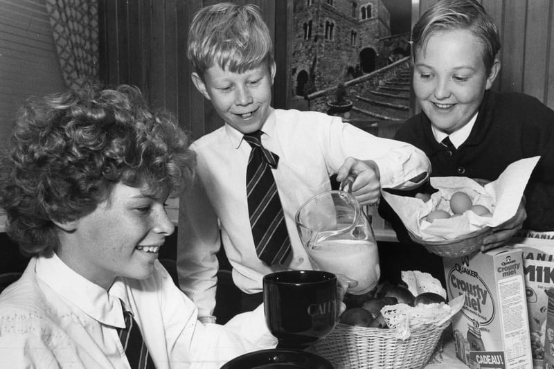 Cafe au lait for Nicola Christie as she enjoys a continental breakfast in the Mortimer Comprehensive School restaurant, with Graham Hall and Ian Maskell. Remember this from September 1990?