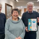 From left, Hartlepool Fairtrade Steering Group members Keith Gorton, Chris Eddowes and Martin Green, holding their Fairtrade Town certificate.