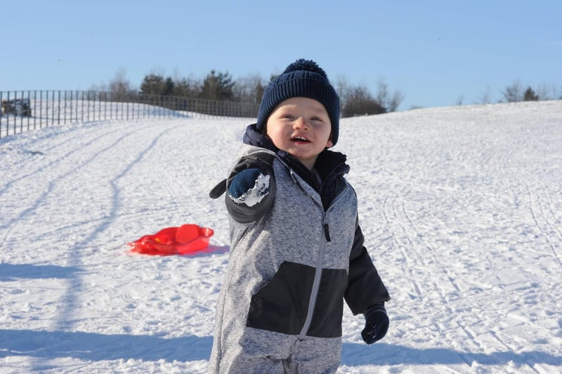 One and a half year-old toddler Freddy having fun in the snow at Herrington Country Park on Thursday following the coldest night in ten years.
