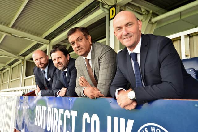 (Left to right) Chief Operating Officer Stephen Hobin, Manager Paul Hartley, Chairman Raj Singh and Assistant Manager Gordon Young photographed in the Suit Direct Stadium. Picture by FRANk REID