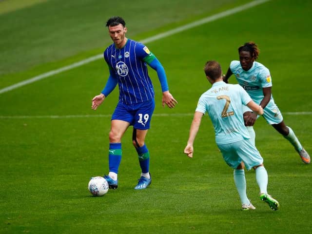 Wigan striker Kieffer Moore is expected to join Cardiff City this week.