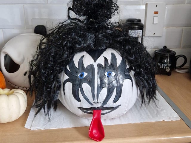 Gene Simmons makes an appearance on a pumpkin. Celebrating National Pumpkin Day and Halloween with Rachel Coates.