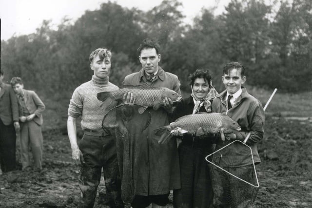 Locals show of their catches of the day in Rossmere Park. Pictured are Mr C McCullagh, Mr C Naylor, Mrs M King and Reginald King.