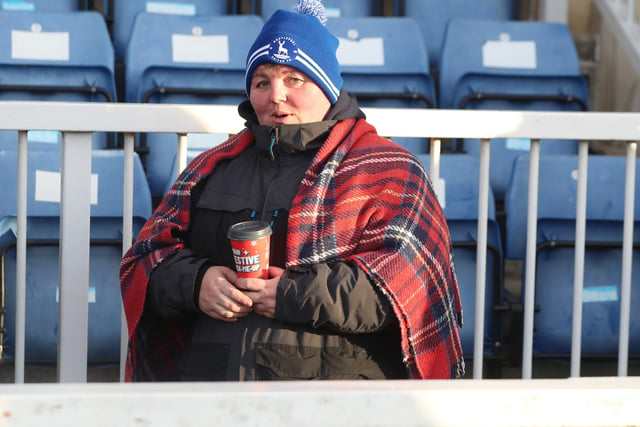 Pools supporters braved the cold at the Suit Direct Stadium against Stockport County. (Credit: Mark Fletcher | MI News)