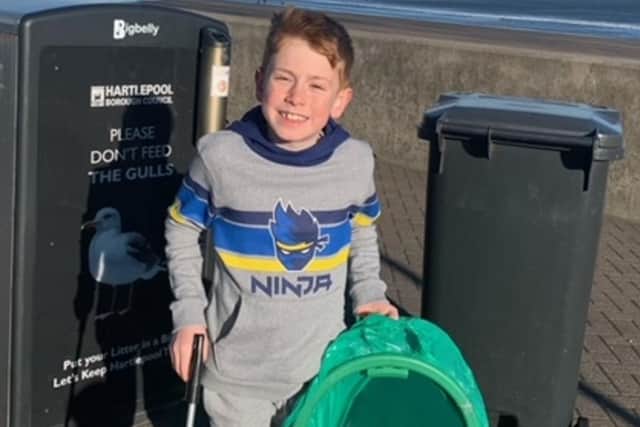 Making a difference. That's litter picker Rory Betts.