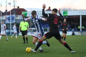 Joe Grey of Hartlepool United in action with Stoke City's Lewis Baker during the FA Cup Third Round tie. (Credit: Mark Fletcher | MI News)