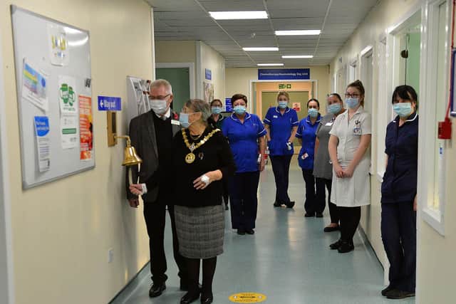 Councillor Brenda Loynes rings the bell for the end of her cancer treatment at the University Hospital of Hartlepool with her husband watched by chemotherapy ward nursing staff. Picture by FRANK REID