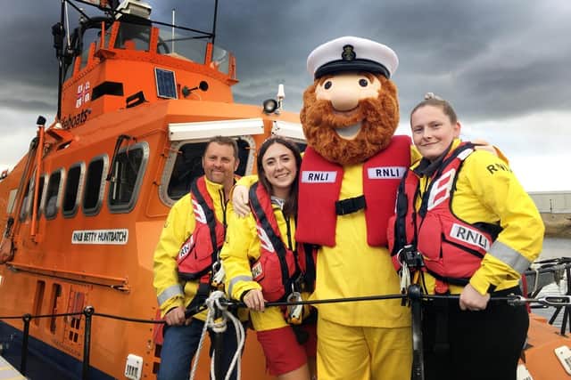 Stormy Stan pictured with (left to right) Hartlepool RNLI volunteer lifeboat crew members Glen Pearson, Daynor Gee and Alex Ramsay. Picture by Tom Collins.