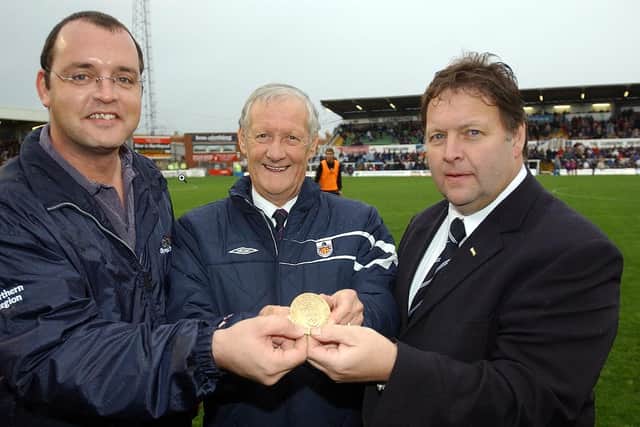 Tom Harvey pictured with then-mayor Stuart Drummond and Russ Green, chief executive of Hartlepool United, as they helped present him with a Durham County FA award at Victoria Park.