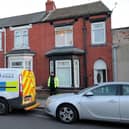 Police outside a house in Wharton Terrace, Hartlepool, following the launch of a murder inquiry into the death of Terrence Carney.