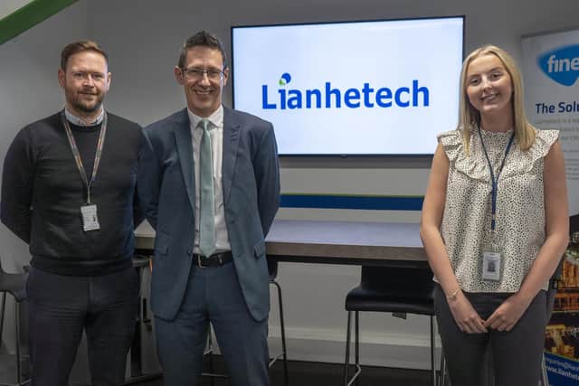 Charlotte King with Hartlepool College assistant principal Gary Riches, left, and Lianhetech general manager Lee Kingsbury.