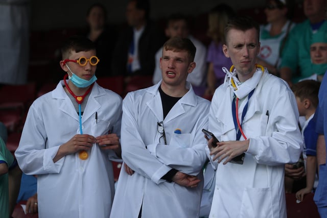 Pools supporters shared in their end of season fancy dress tradition with this year's theme of doctors and nurses. (Credit: Mark Fletcher | MI News)