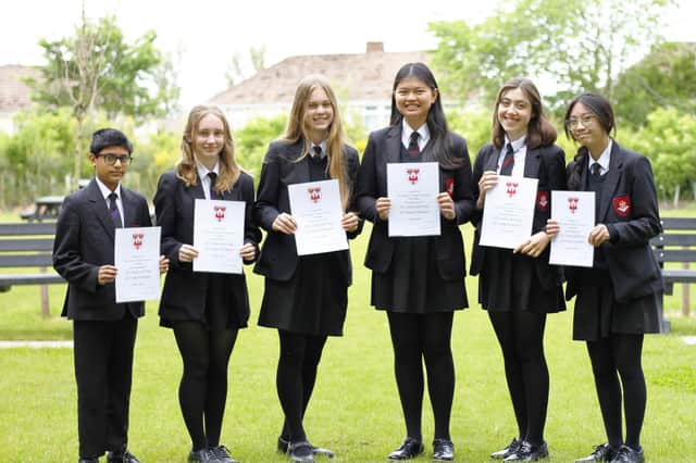 English Martyrs School and Sixth Form's competition entrants (left to right) Hashir Ahmad, Ruby Dobson, Charlotte Boagey, winner Andrea Simbul, Amelie Bilton and Alexandra Beltran.