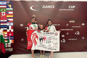 From left, Millie Bedding, 18, Ava Doughty, nine, and Kaitlin Eglintine, 19, came third in their acrobatic trio at this year's Dance World Cup.