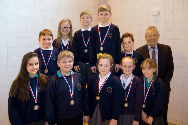 Pupils are awarded medals for the swimming.