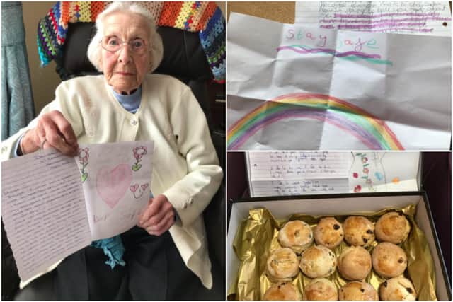A Charlotte Grange resident with some of the letters - and treats - the home has received after launching a pen pals scheme.