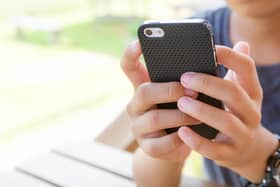 Starting secondary school age is the time most young people get their first mobile phone. Photo Abode Stock