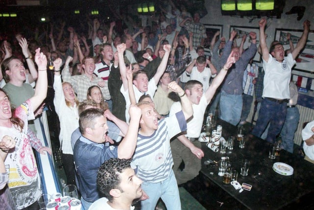 England fans at the Sports Bar in Park Road as England fans watch Alan Shearer score during the England versus Germany match in 1996.