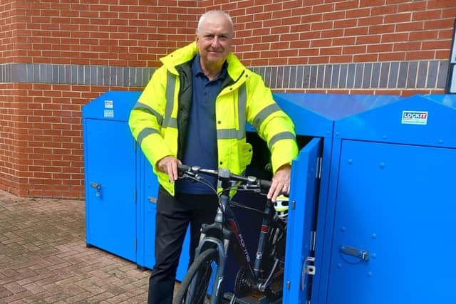 Road safety and sustainable travel officer, Justin Goult, beside the new bike lockers in Villiers Street, Hartlepool.